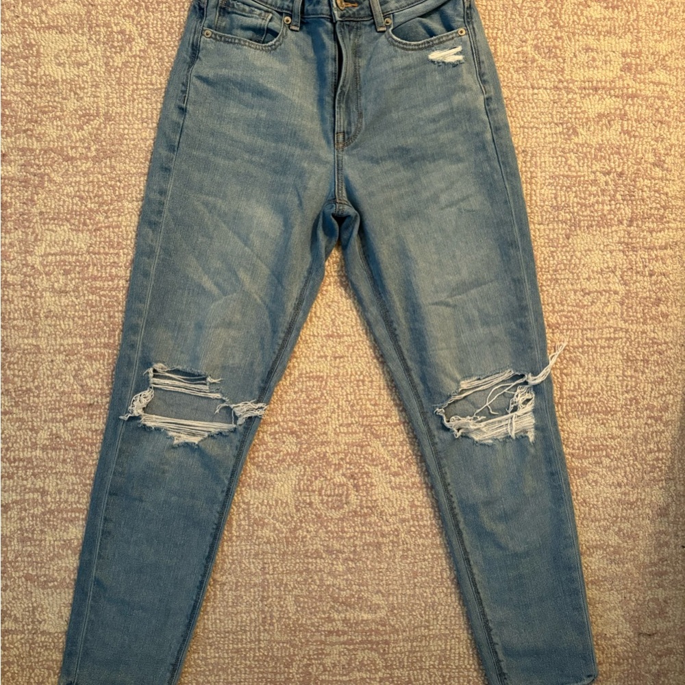 Distressed Blue Denim Jeans